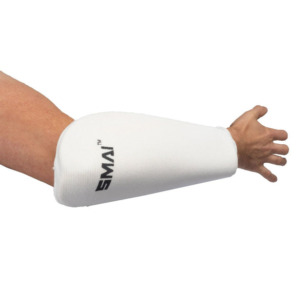 Arm wearing white martial arts forearm guard