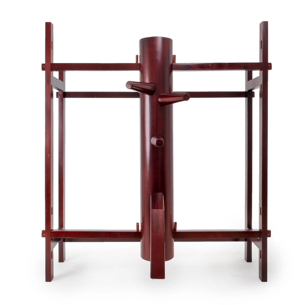 The Kung Fu Dummy - Freestanding by SMAI is a dark rosewood training tool designed for Wing Chun, featuring a vertical post with three horizontal wooden arms and a leg framed by supporting beams against a plain white background.
