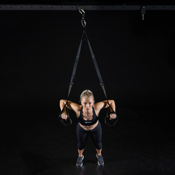 Woman using Suspension Trainer - GTS