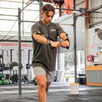 SMAI Resistance Tube Trainer being used by a man chest fly