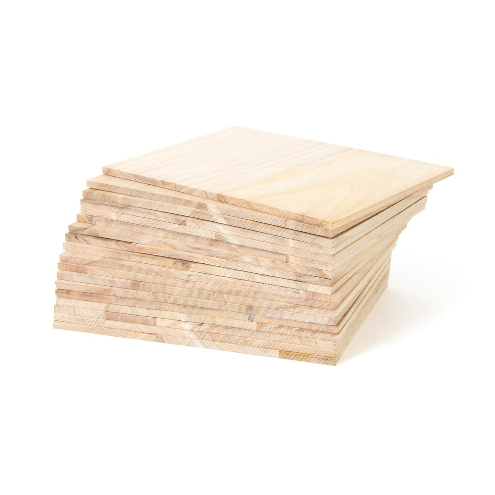 A neatly arranged stack of SMAI's Paulownia Wood Break Boards - 20pack of 0.8cm is displayed on a white background, showcasing the light color and distinctive grain patterns of the Paulownia wood.