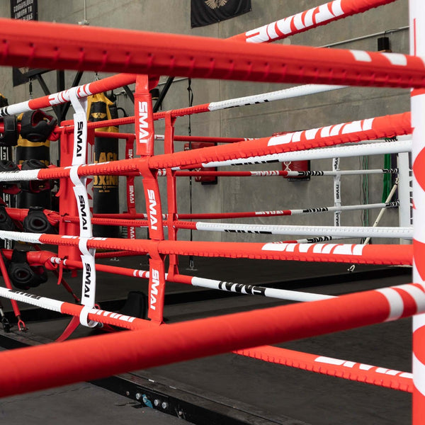 boxing ring rope covers red and white on a boxing ring