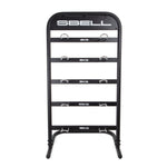 The SBELL Stand by Sbell Training elegantly arranges a set of five kettlebells for optimal gym organization. Each weight—4kg, 6kg, 8kg, 10kg, and 12kg—is prominently displayed on its own shelf. The black vertical stand is set against a pristine white background, making it a perfect choice for fitness enthusiasts.