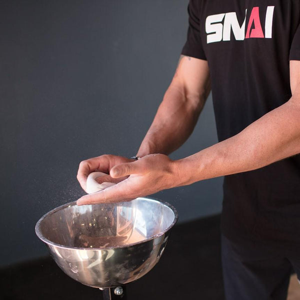 Crossfit Games athlete using SMAI Sports Chalk 2