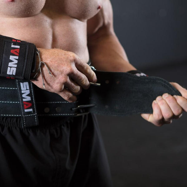 Weight Lifting Belt - Premium Suede Man tightening his belt