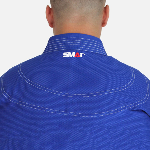 Supreme Brazilian Jiu Jitsu Uniform - Blue Close up of SMAI Logo on back of neck