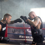 Men using the Elite85 Boxing Mitts