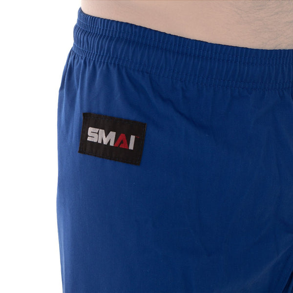 Karate Uniform - 8oz Student Gi (Blue) Pants close up of SMAI Logo
