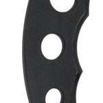 Close-up of the SMAI Kama - Training PP - Unbreakable, a black polypropylene tool featuring a textured surface and four circular holes. The object has a curved, wavy edge reminiscent of those used in Okinawan kobudo training. The background is white.