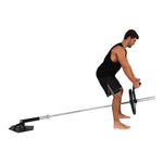 Man using SMAI Core Trainer Landmine with T Bar Handles pushing a 20kg barbell with a bumper plate