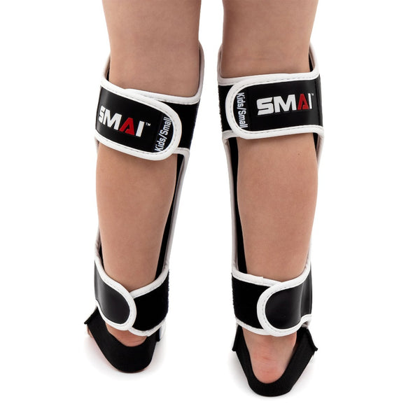 Essentials Muay Thai Shin Guards - Kids (pair) back view on foot