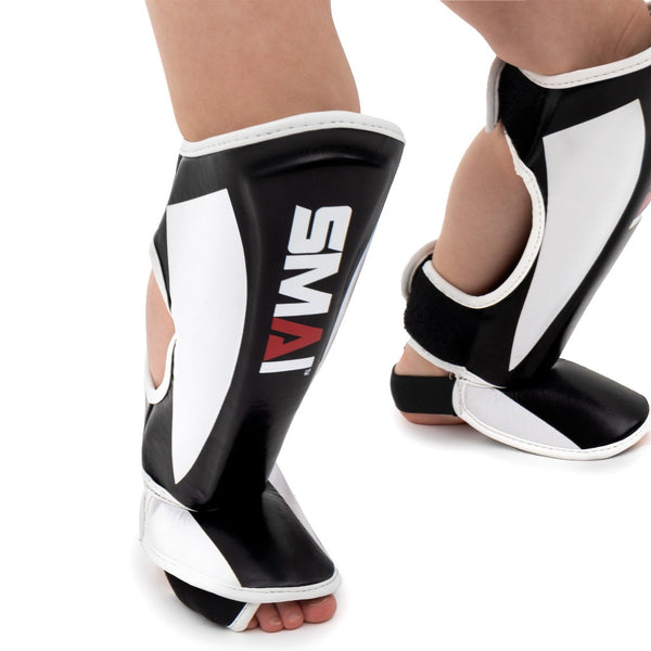 Essentials Muay Thai Shin Guards - Kids (pair) on foot