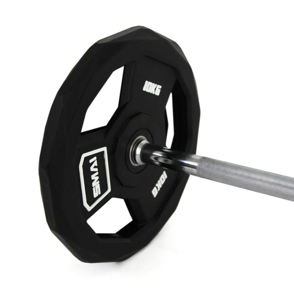 Pump Set - 26.5KG Close up of Weight plate on barbell