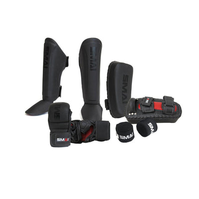 Elite85 Kickboxing Combo includes 1 x Pair Elite85 MMA Hybrid Sparring Gloves  1 x Pair Elite85 Thai Shin Guards  1 x Pair of Elite85 Thai Pads  1 x Pair Boxing Wraps in Black