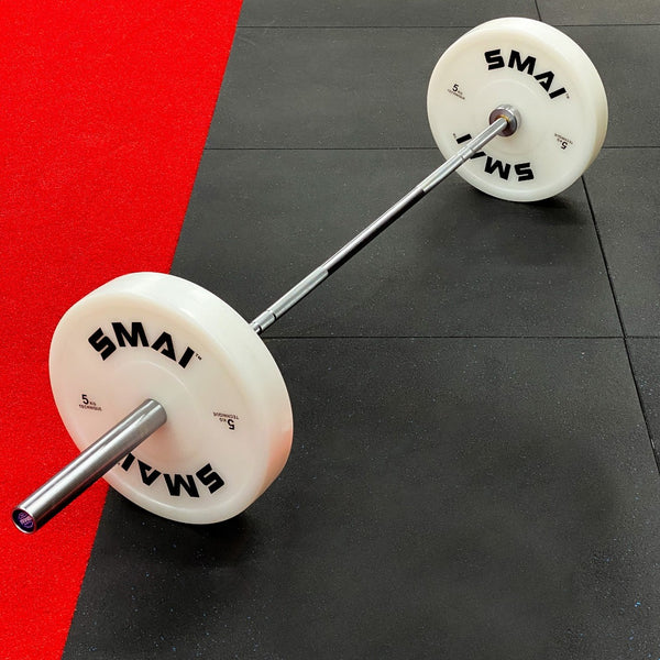 Pro Technique Bumper Plate 5kg (Pair) On a barbell