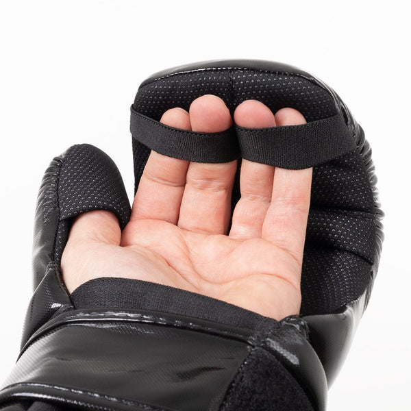 Martial Arts Gloves - Tournament Carbon Hand shown palm side up wearing glove